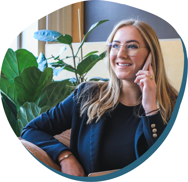 young woman talking on her cell phone and smiling